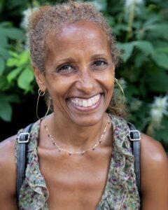 A woman smiling.